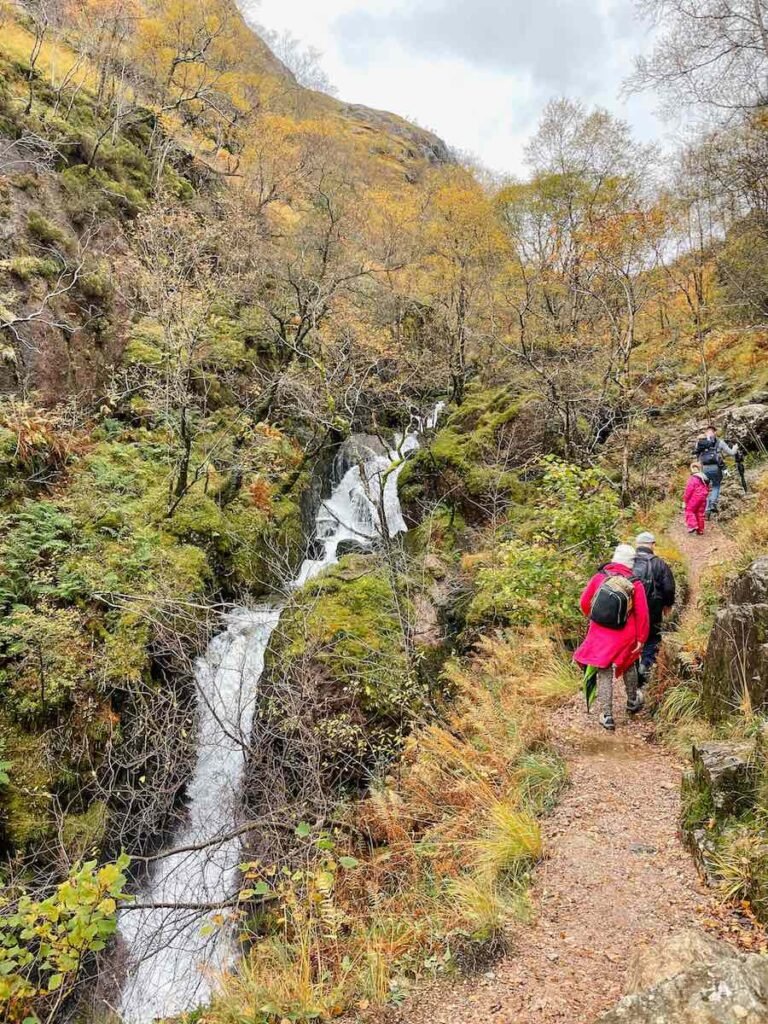 Family walk next to a gorge in the Lost Valley Glen Coe