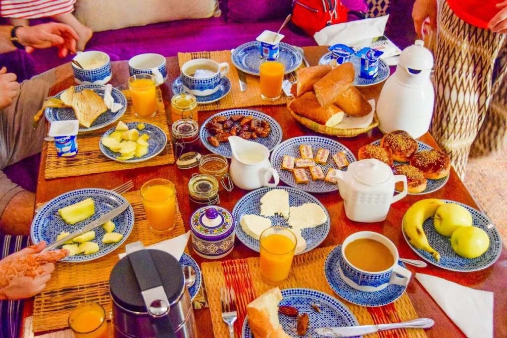 Moroccan breakfast, with fruit, breads and coffee