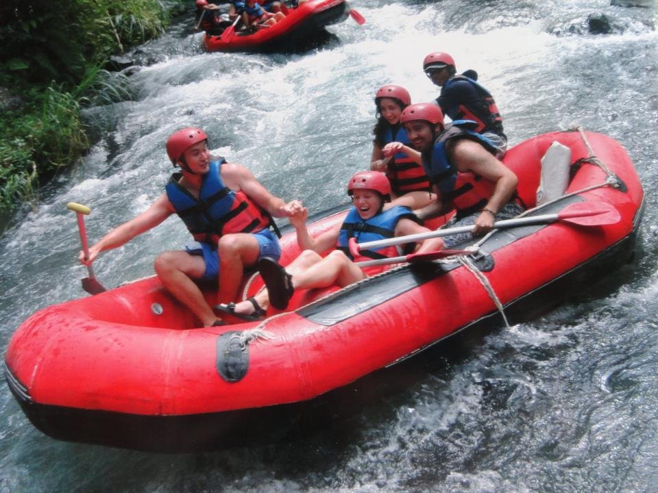 Travellers enjoy white water rafting in Ubud